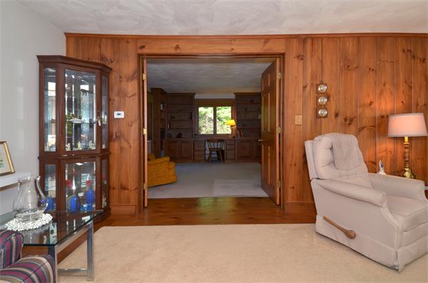 56 Baldpate Road Georgetown, MA 01833 - Photo 6 of 30 a living room with furniture and a fireplace