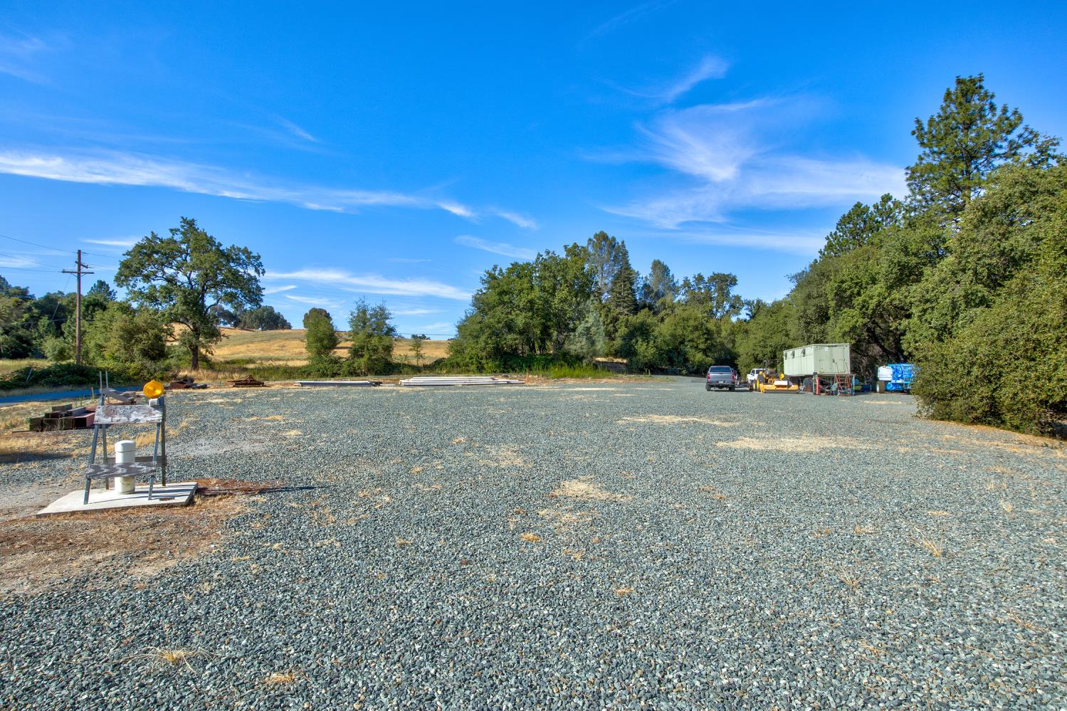 13555 Oakstream Road Plymouth, CA 95669 - Photo 24 of 43 a view of a road with a building in the background