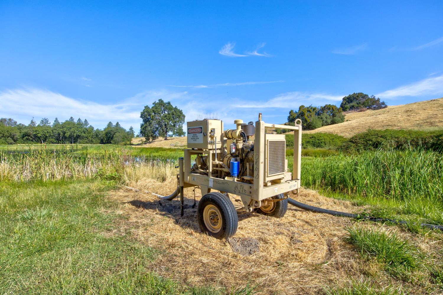 13555 Oakstream Road Plymouth, CA 95669 - Photo 28 of 43 a view of a lake with a yard