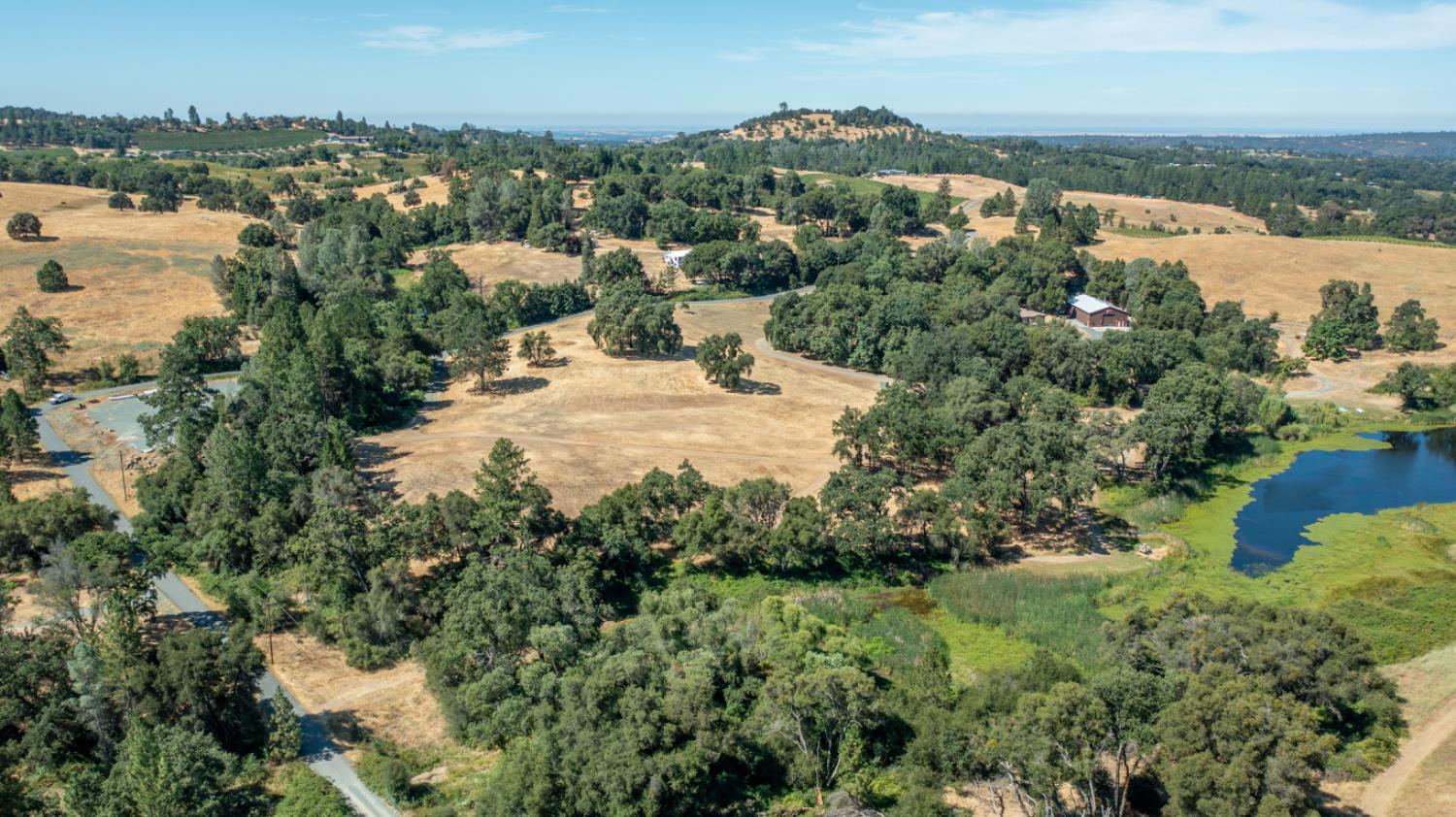 13555 Oakstream Road Plymouth, CA 95669 - Photo 41 of 43 a view of a lake with a city