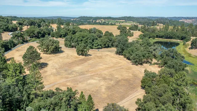 a view of lake with mountain in the background