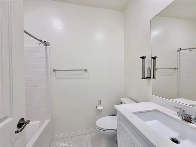 a bathroom with a sink and shower