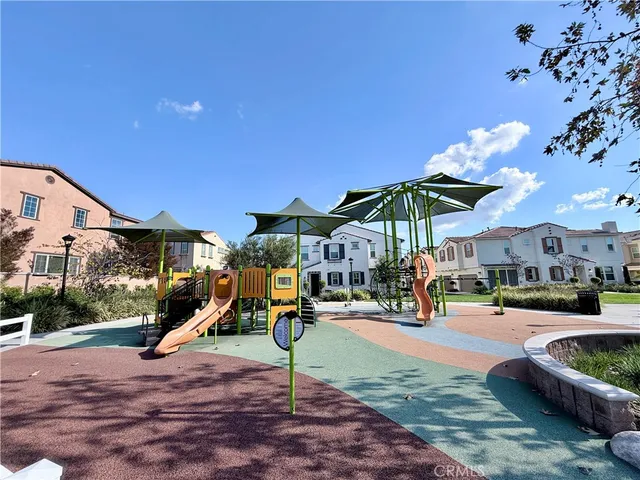 a view of a park with swings