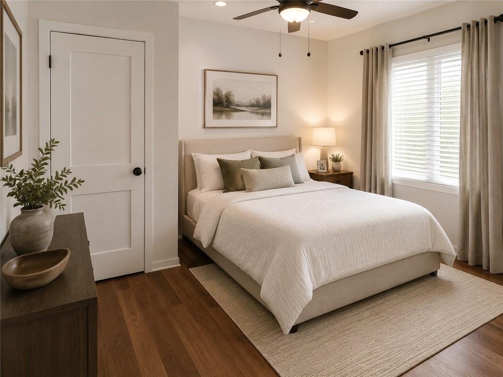 2290 Wilkins Cove Decatur, GA 30035 - Photo 13 of 21 a bedroom with a bed and a potted plant