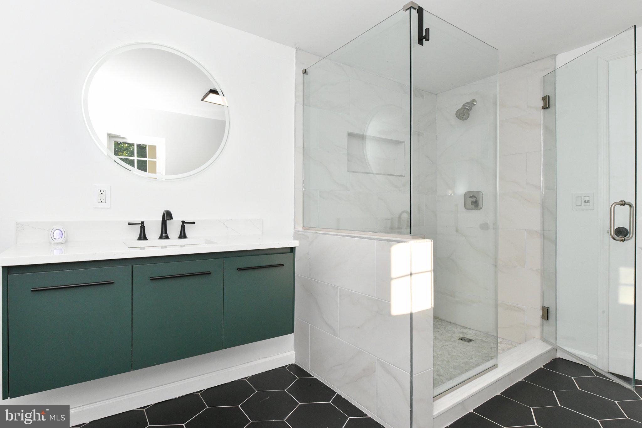 271 Friendship Road Cranbury, NJ 08512 - Photo 13 of 25 Sleek modern bathroom with elegant design.