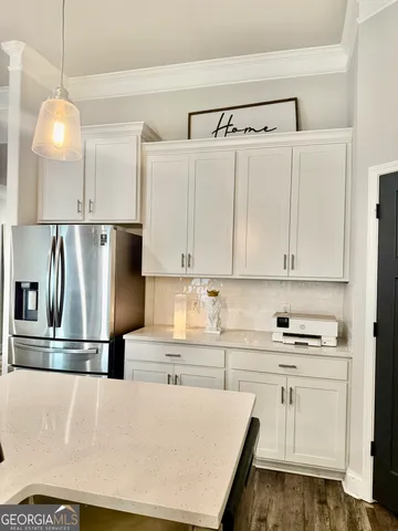 a view of a center island and living room