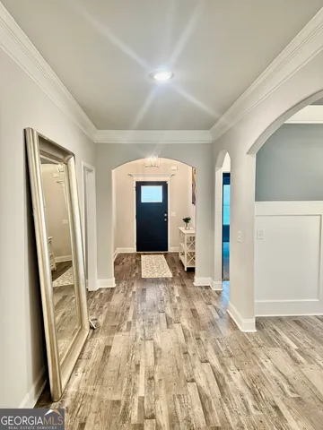 a view of an empty room and window