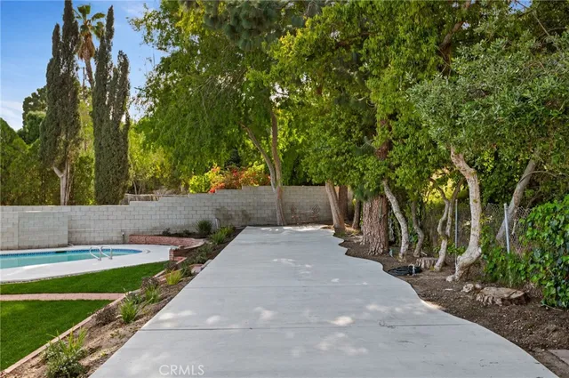 a view of backyard with green space