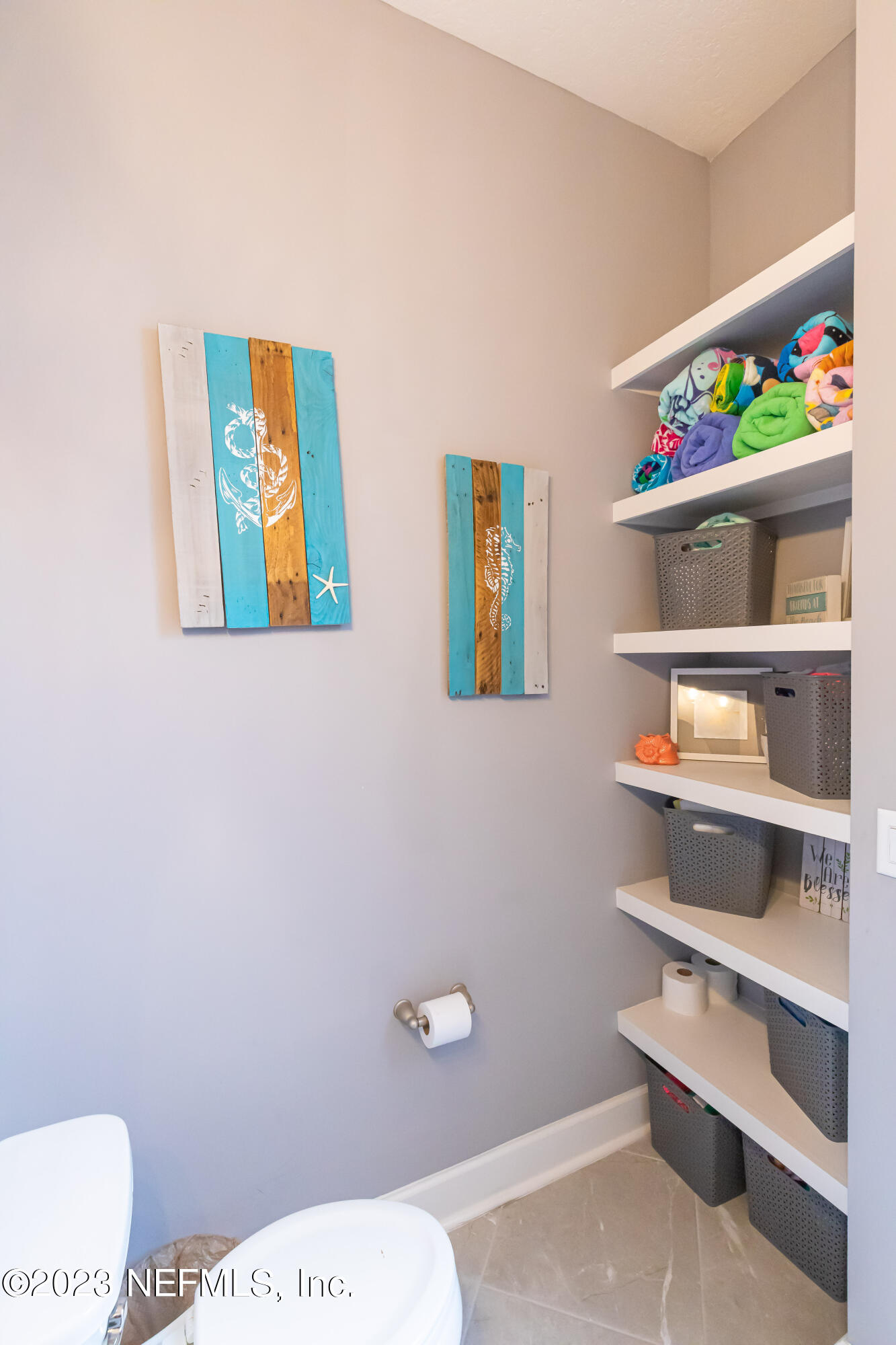 299 Tate Lane St. Johns, FL 32259 - Photo 34 of 55 a bathroom with a toilet