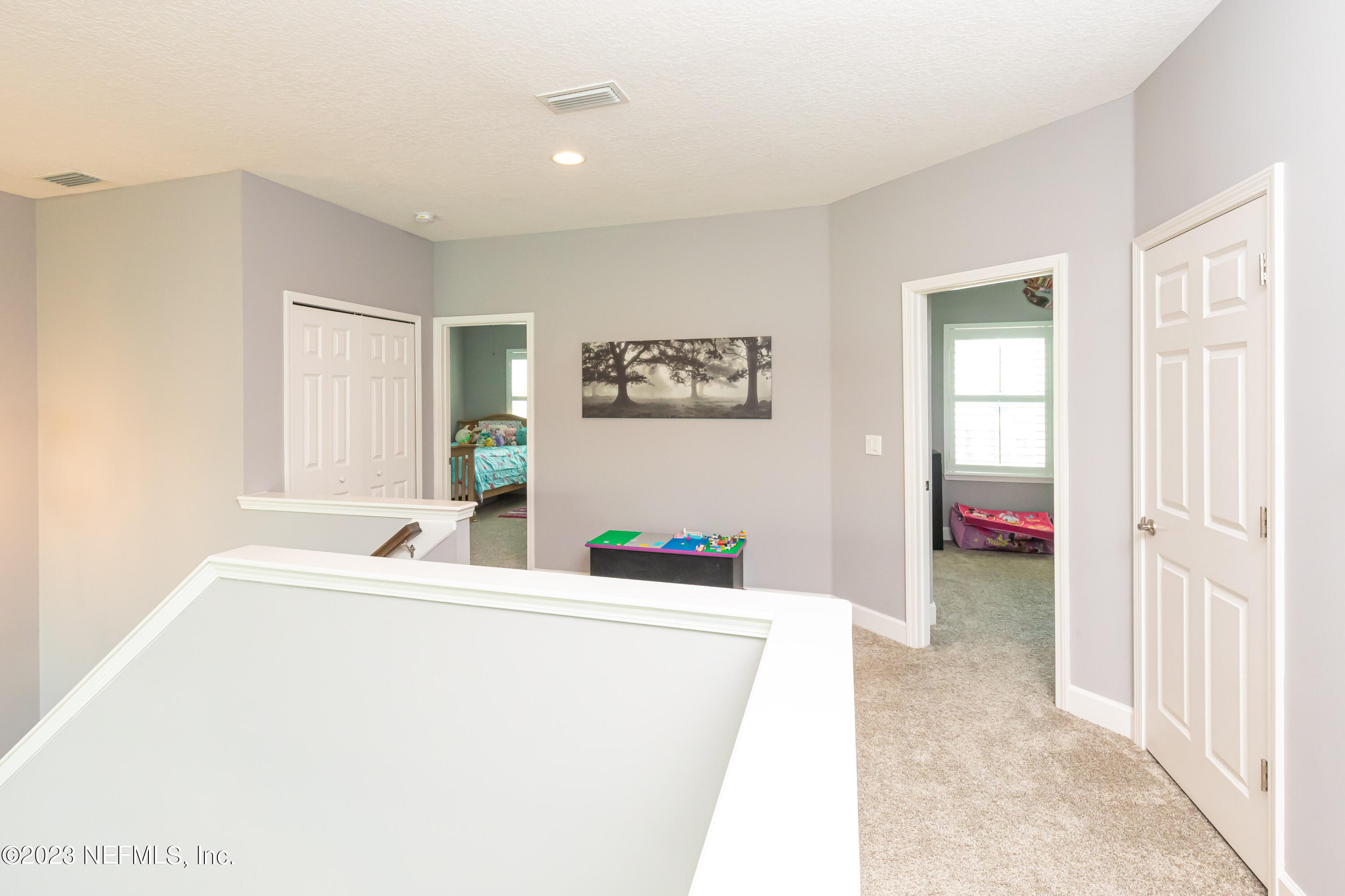 299 Tate Lane St. Johns, FL 32259 - Photo 38 of 55 a room with a couch and a window