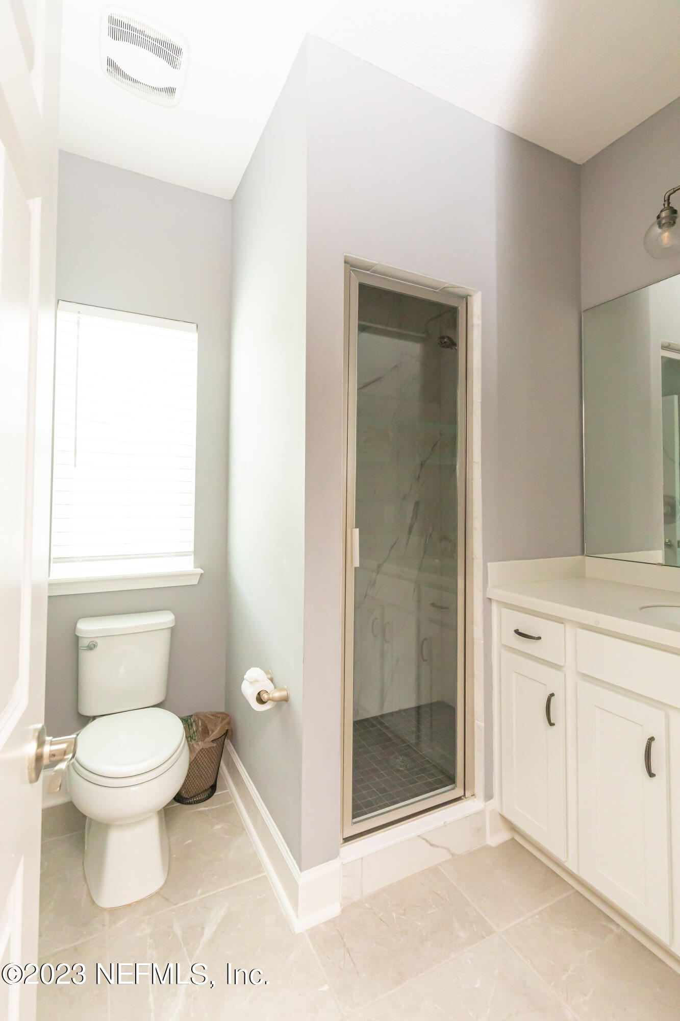 299 Tate Lane St. Johns, FL 32259 - Photo 47 of 55 a bathroom with a toilet and a shower