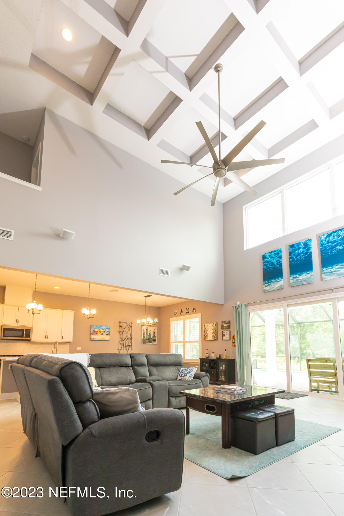 299 Tate Lane St. Johns, FL 32259 - Photo 10 of 55 a living room with furniture and a large window