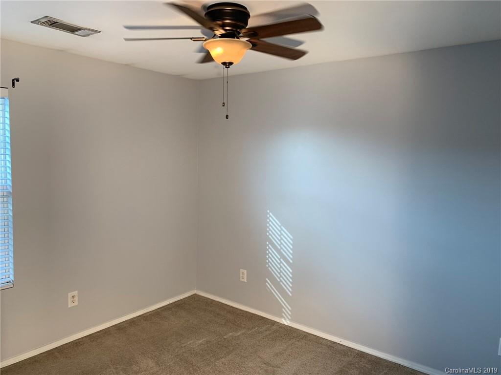 665 Potter Place Road, Unit 105 Fort Mill, SC 29708 - Photo 7 of 14 an empty room with a window