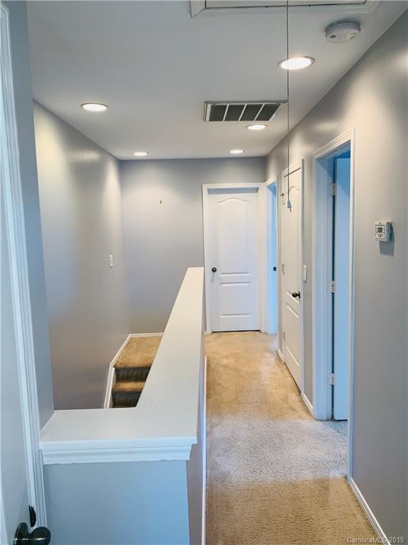 665 Potter Place Road, Unit 105 Fort Mill, SC 29708 - Photo 10 of 14 a view of a hallway with entryway