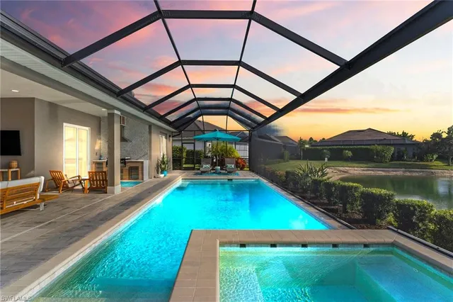 a view of a backyard with swimming pool