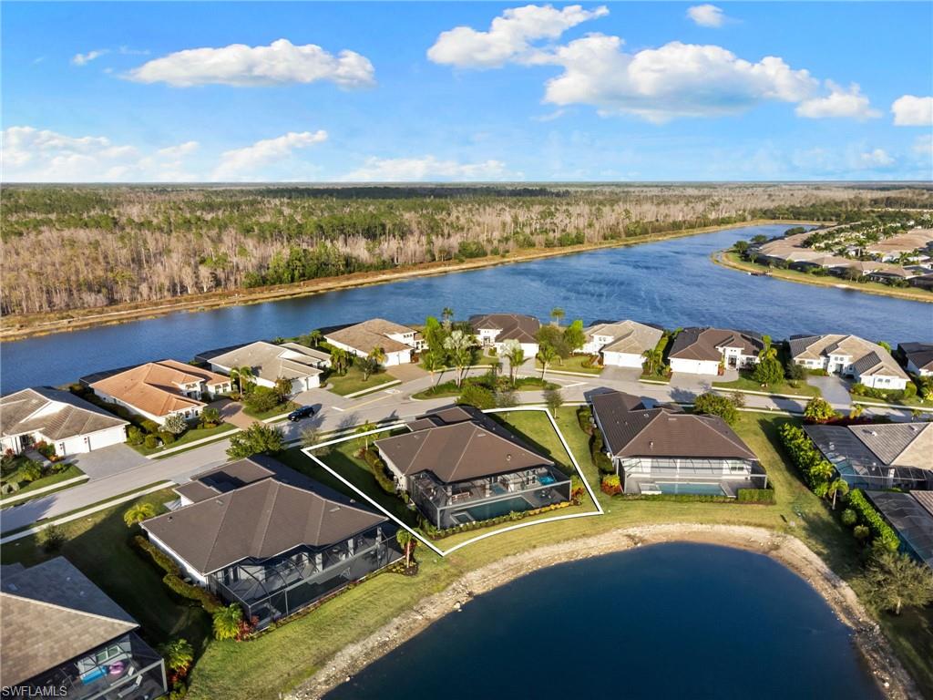 14433 Neptune Avenue Naples, FL 34114 - Photo 33 of 38 an aerial view of a house with a ocean view
