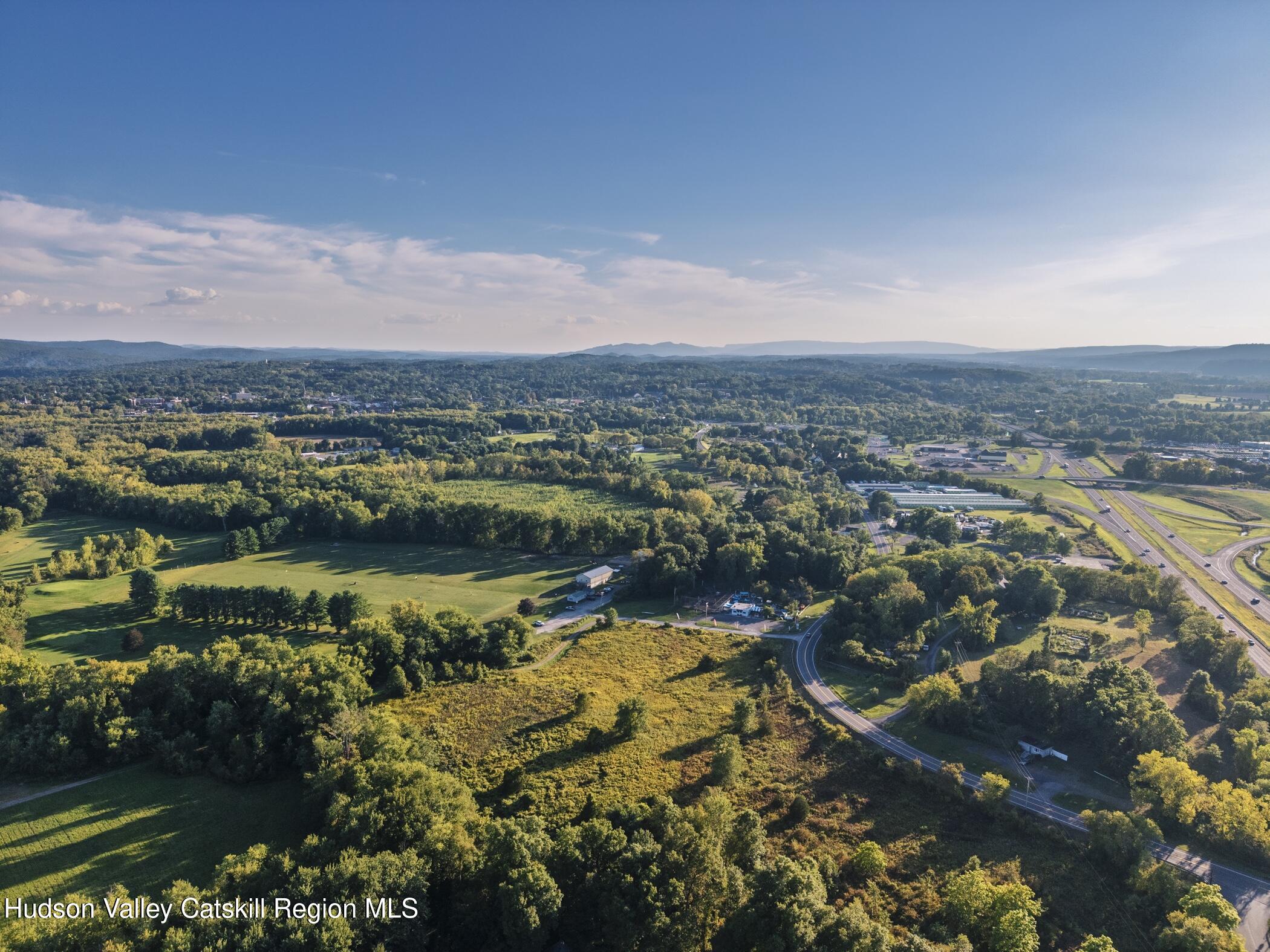 220 Sawkill Road Kingston, NY 12401 - Photo 14 of 19 a view of a lake with a city