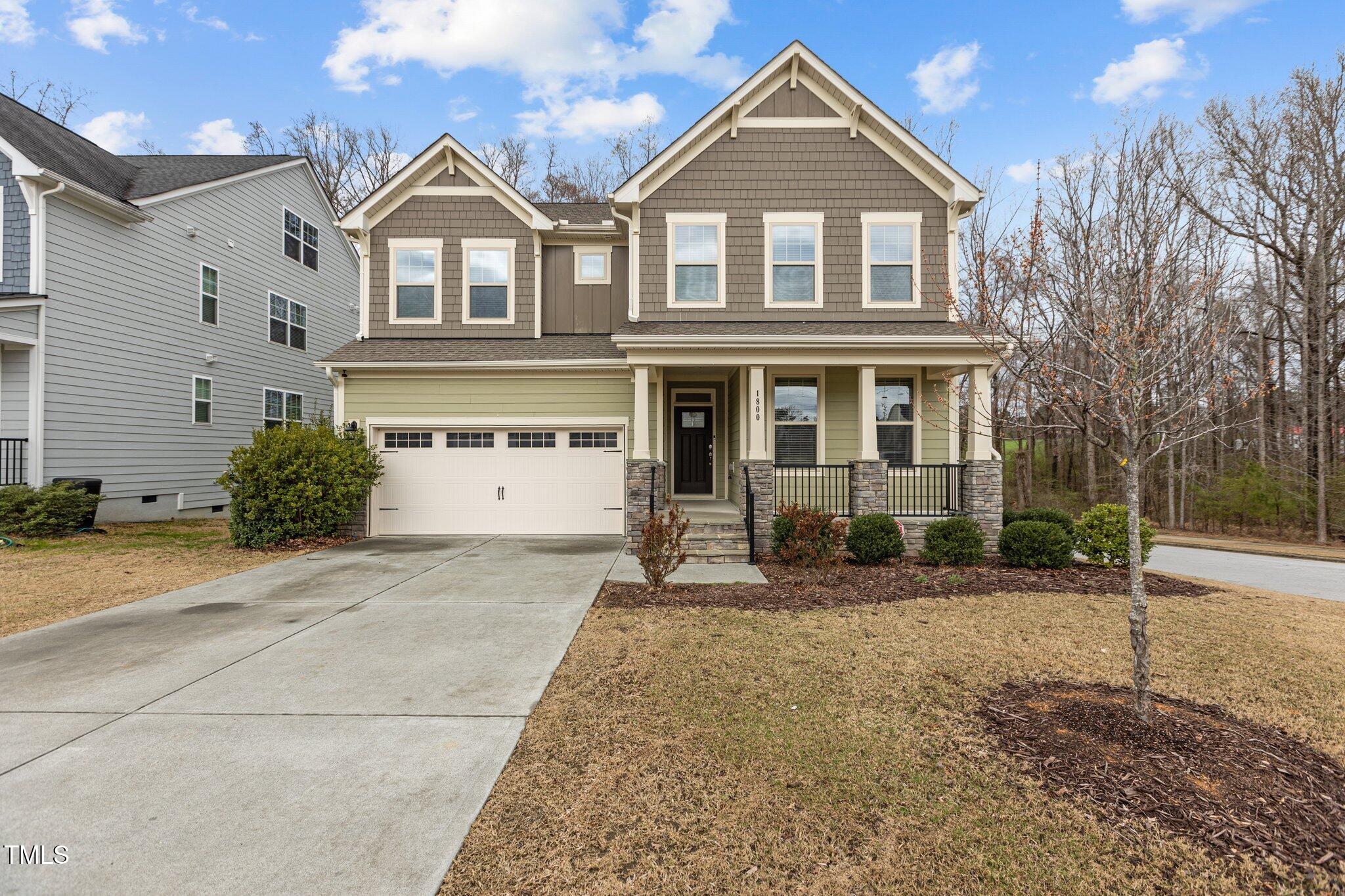 1800 Bodwin Lane Apex, NC 27502 - Photo 1 of 63 a front view of a house with a yard