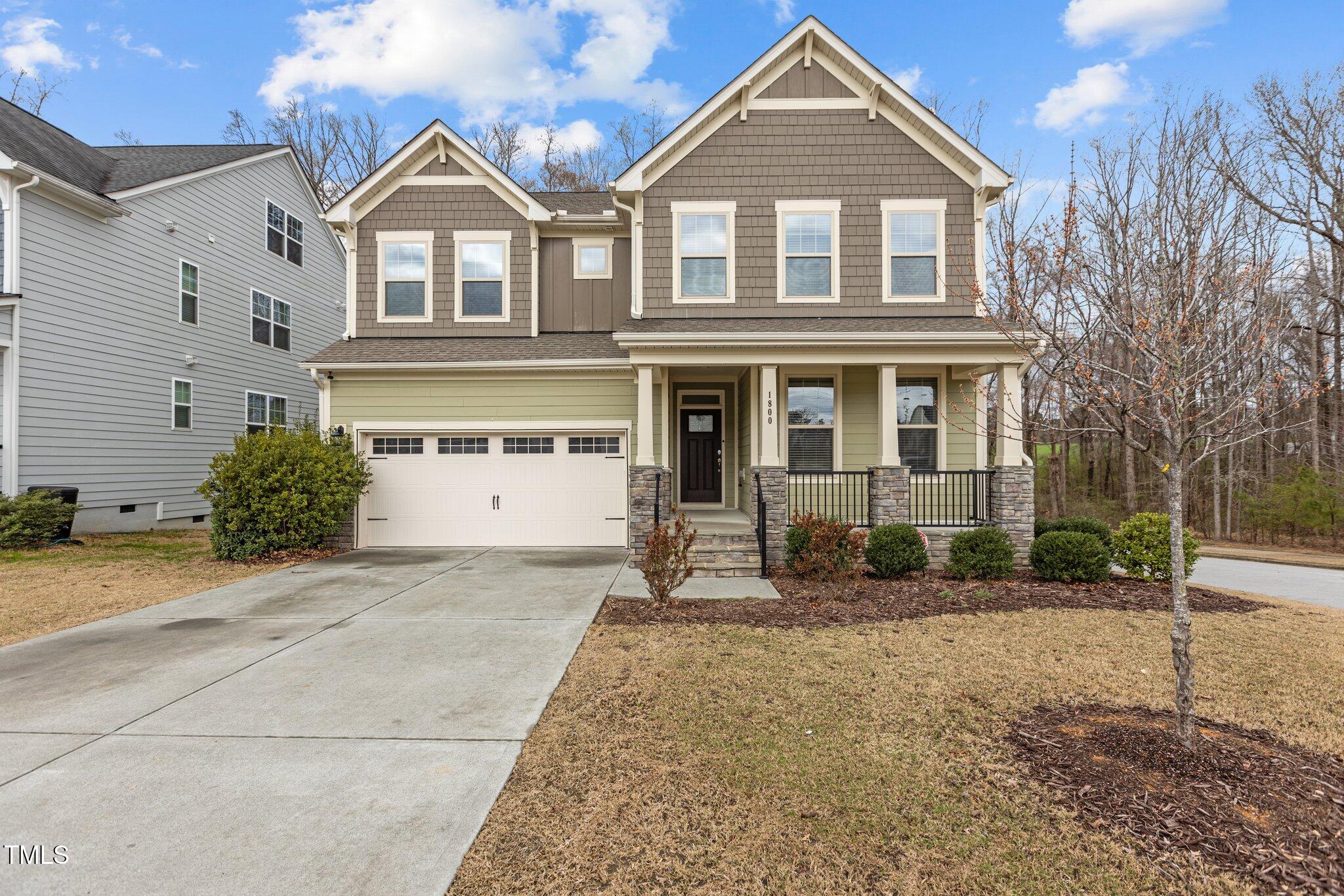 1800 Bodwin Lane Apex, NC 27502 - Photo 2 of 63 a front view of a house with a yard