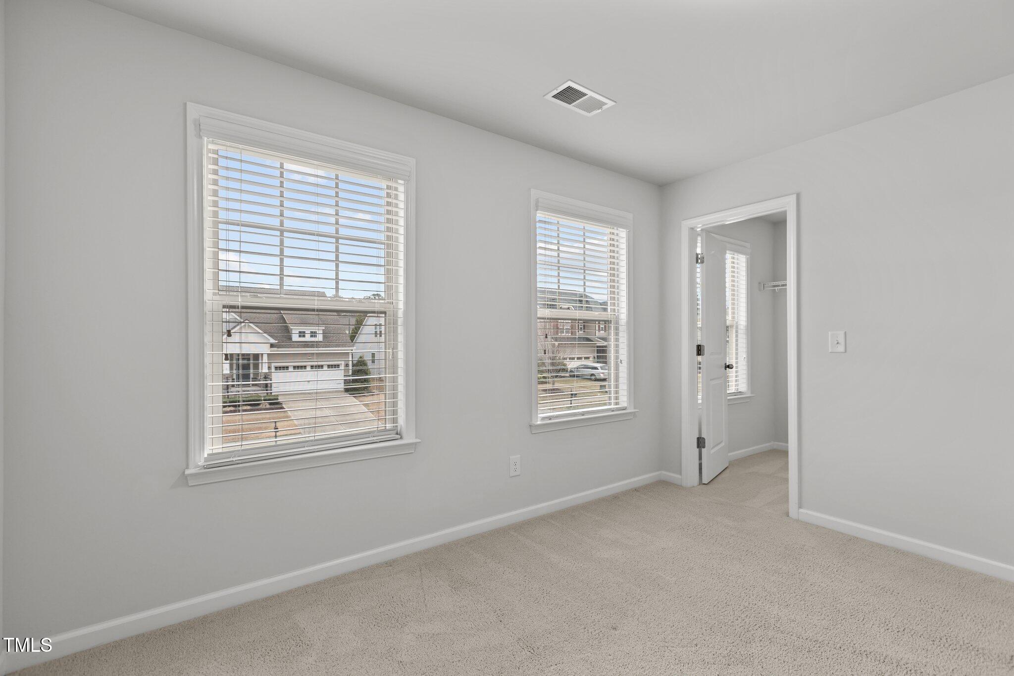 1800 Bodwin Lane Apex, NC 27502 - Photo 30 of 63 an empty room with windows
