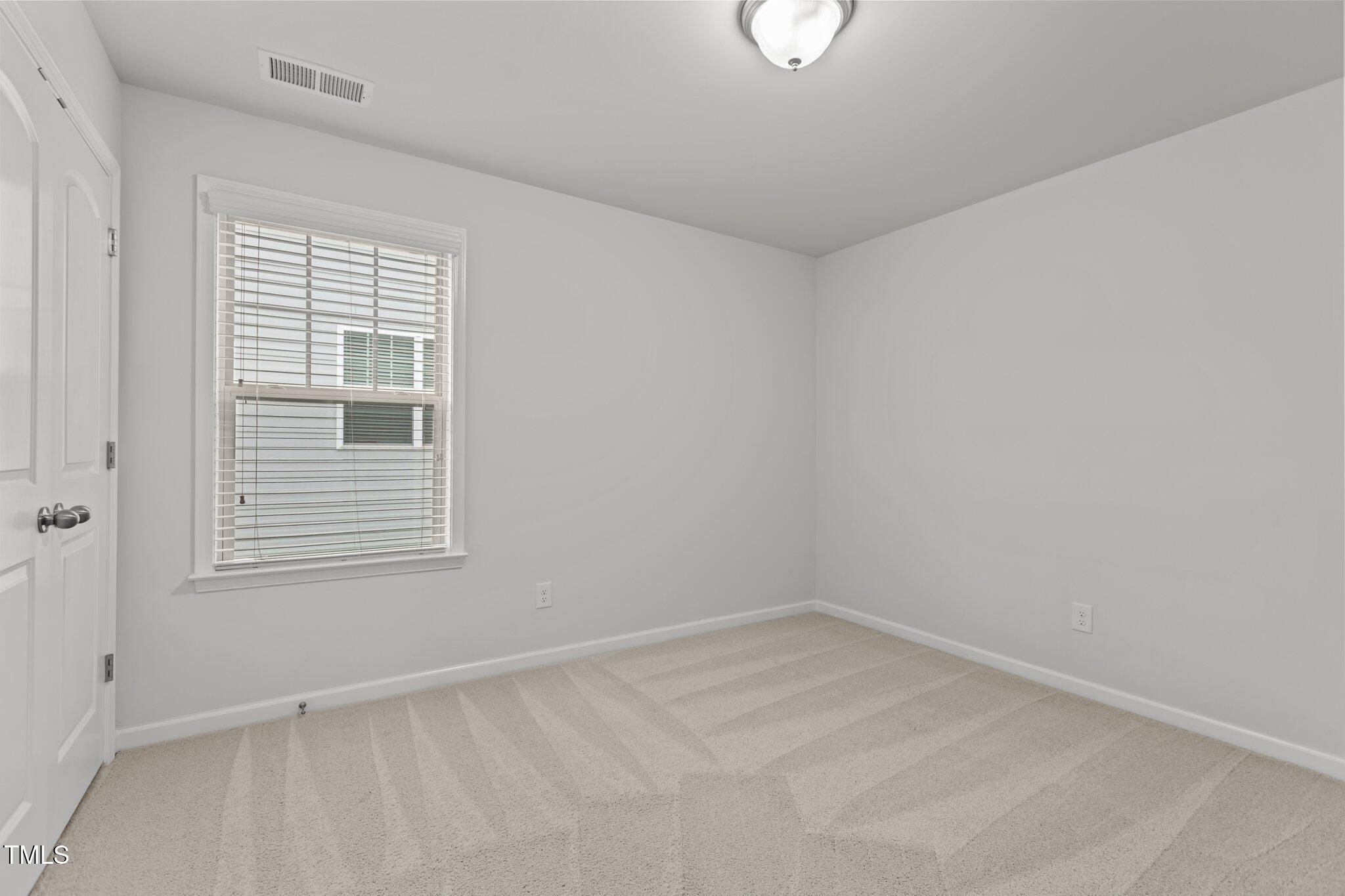 1800 Bodwin Lane Apex, NC 27502 - Photo 33 of 63 an empty room with a window