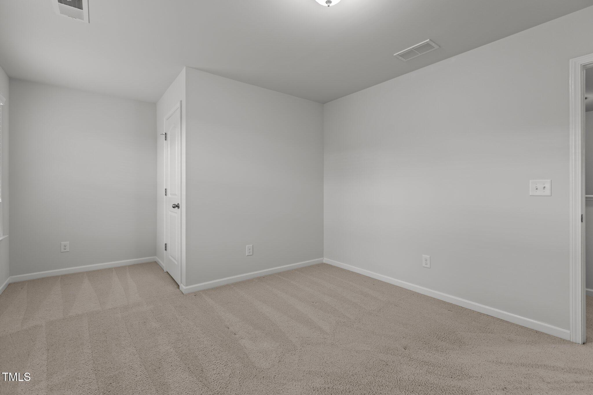 1800 Bodwin Lane Apex, NC 27502 - Photo 36 of 63 a view of an empty room