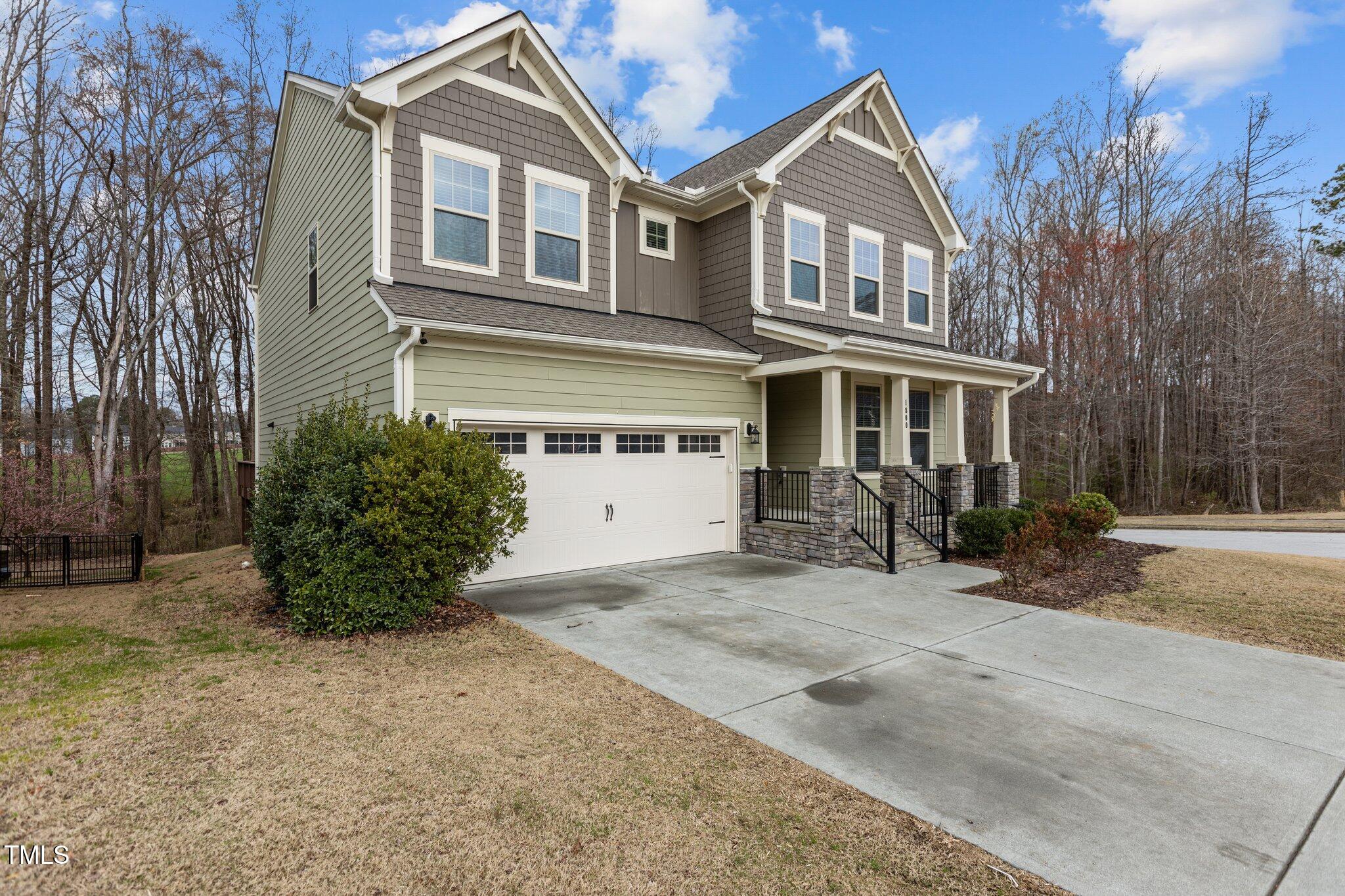 1800 Bodwin Lane Apex, NC 27502 - Photo 38 of 63 a front view of a house with a yard