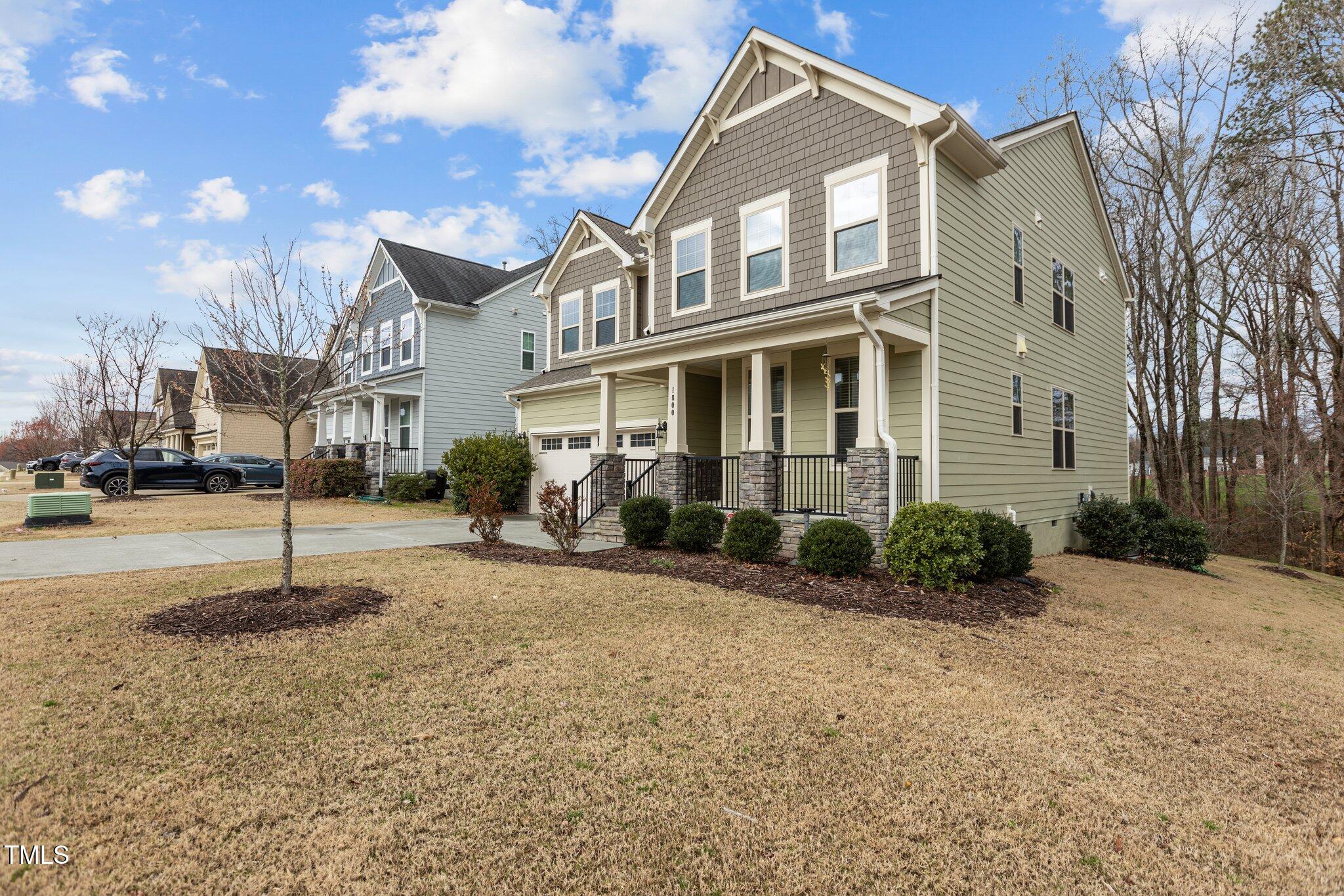 1800 Bodwin Lane Apex, NC 27502 - Photo 39 of 63 a view of a house with a yard