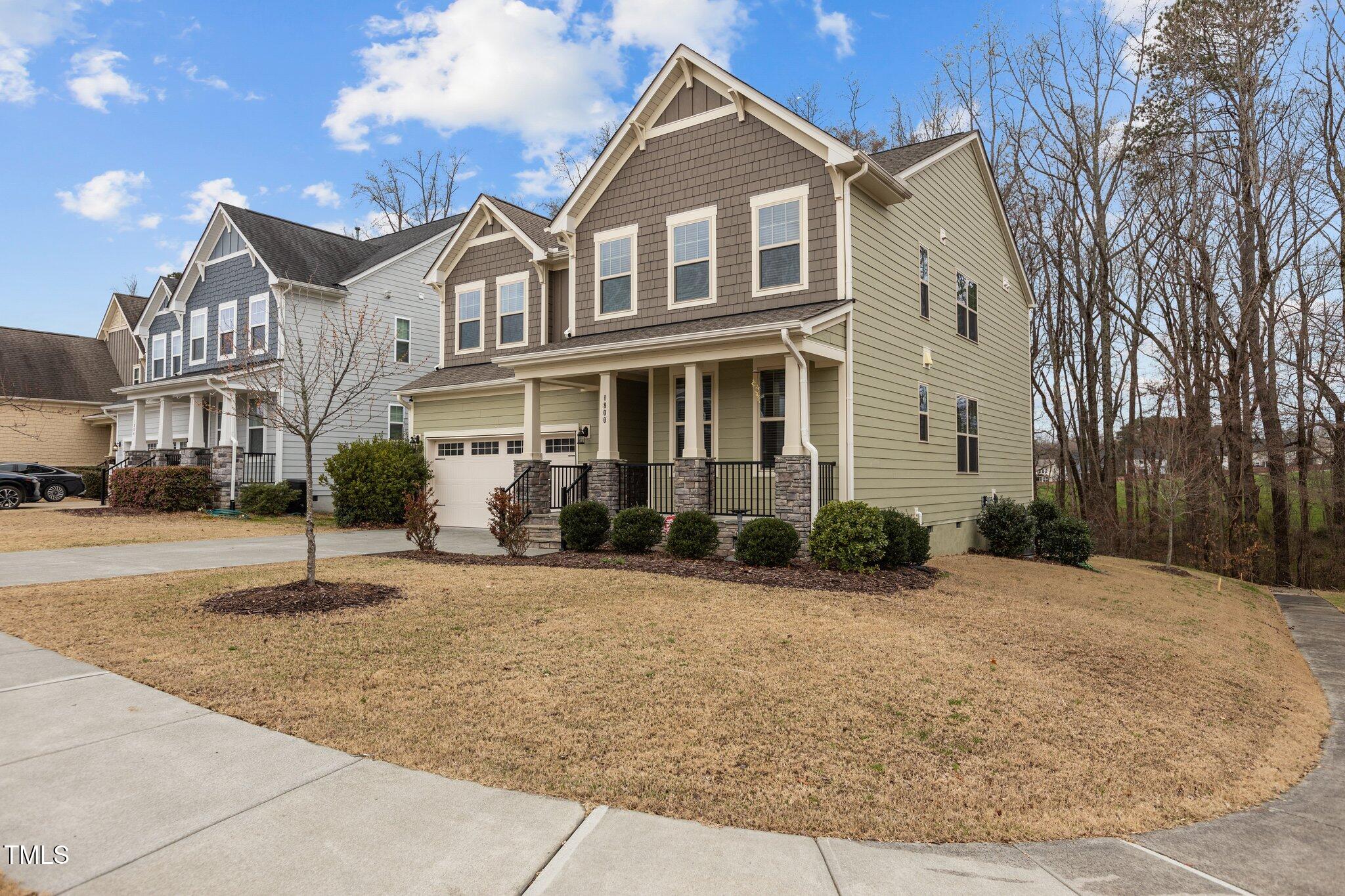 1800 Bodwin Lane Apex, NC 27502 - Photo 43 of 63 a front view of a house with a yard