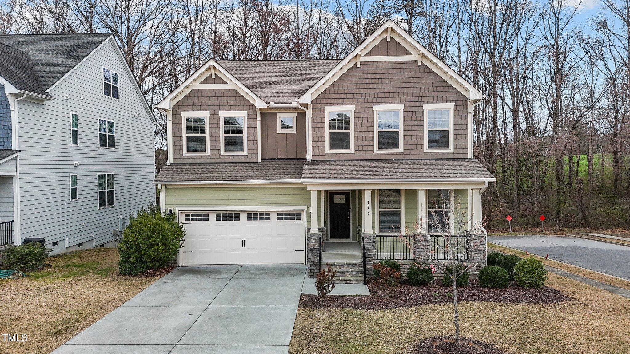 1800 Bodwin Lane Apex, NC 27502 - Photo 48 of 63 a view of a house with a yard and large tree