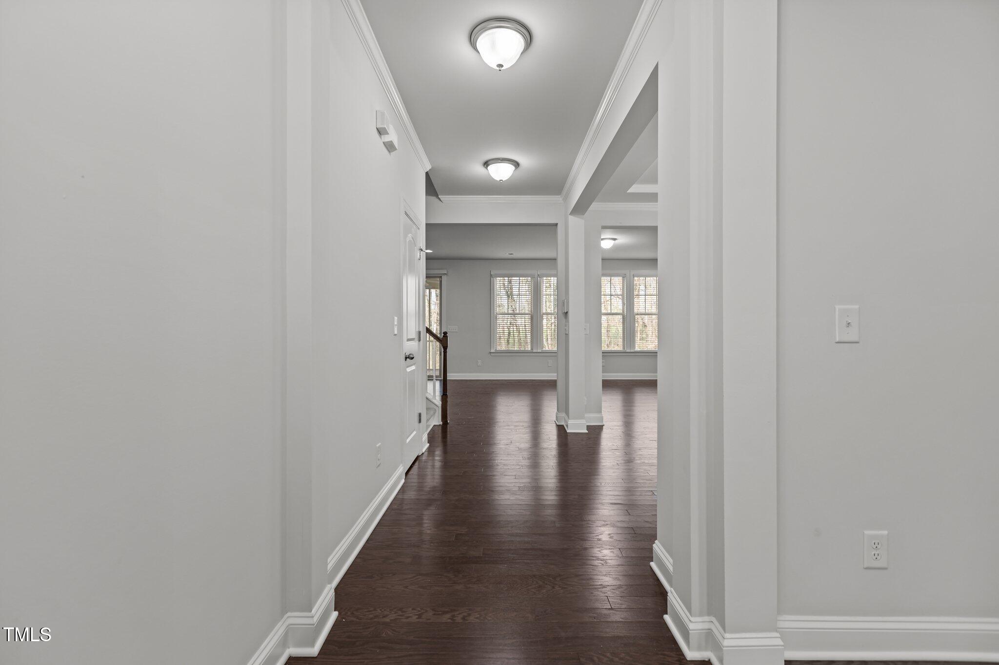 1800 Bodwin Lane Apex, NC 27502 - Photo 4 of 63 a view of hallway with wooden floor