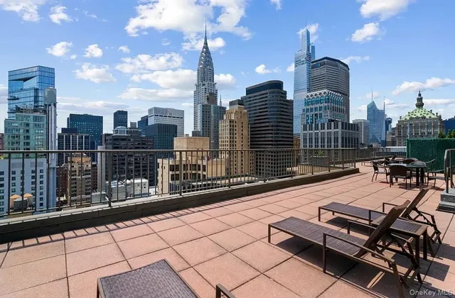 a view of a terrace with sitting area