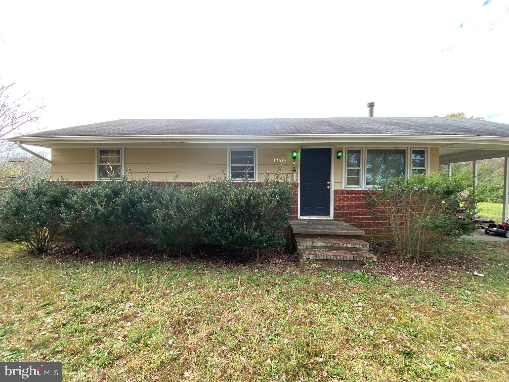 10514 Robert E Lee Drive Spotsylvania, VA 22551 - Photo 1 of 28 a view of a house with a garden