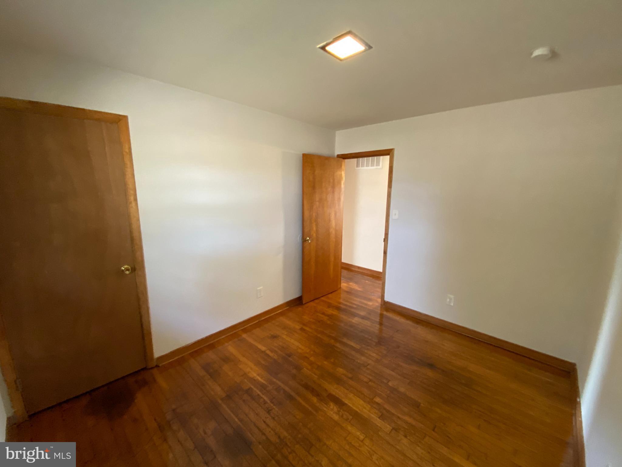 10514 Robert E Lee Drive Spotsylvania, VA 22551 - Photo 12 of 28 an empty room with wooden floor and closet