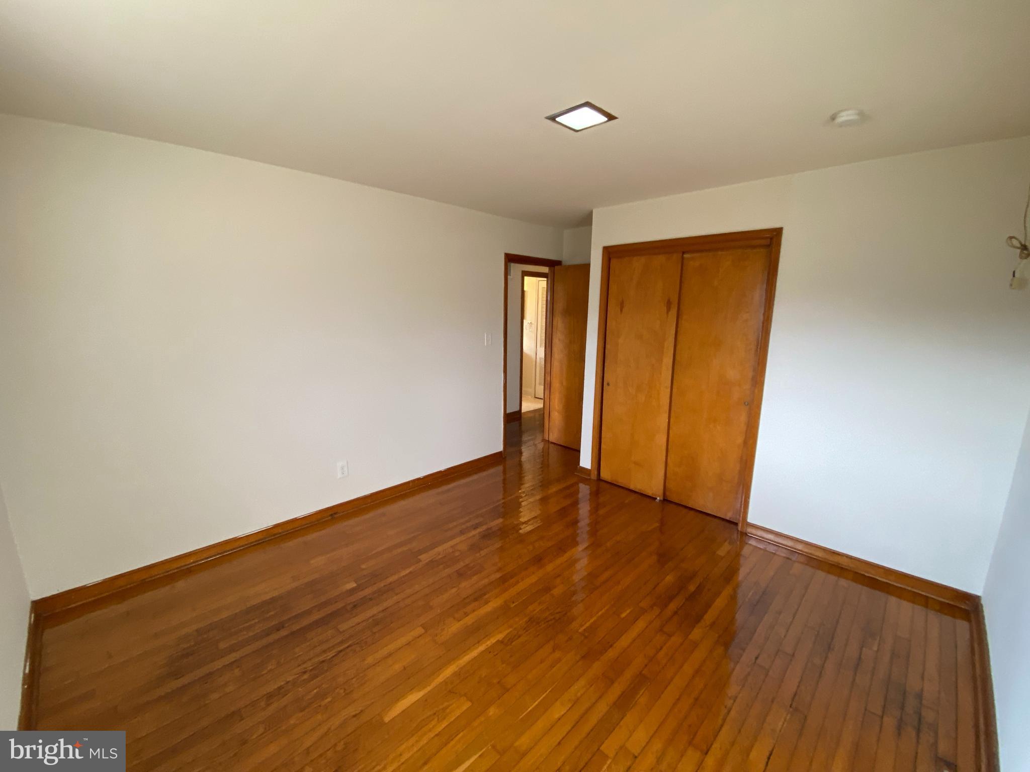 10514 Robert E Lee Drive Spotsylvania, VA 22551 - Photo 16 of 28 a view of an empty room with wooden floor