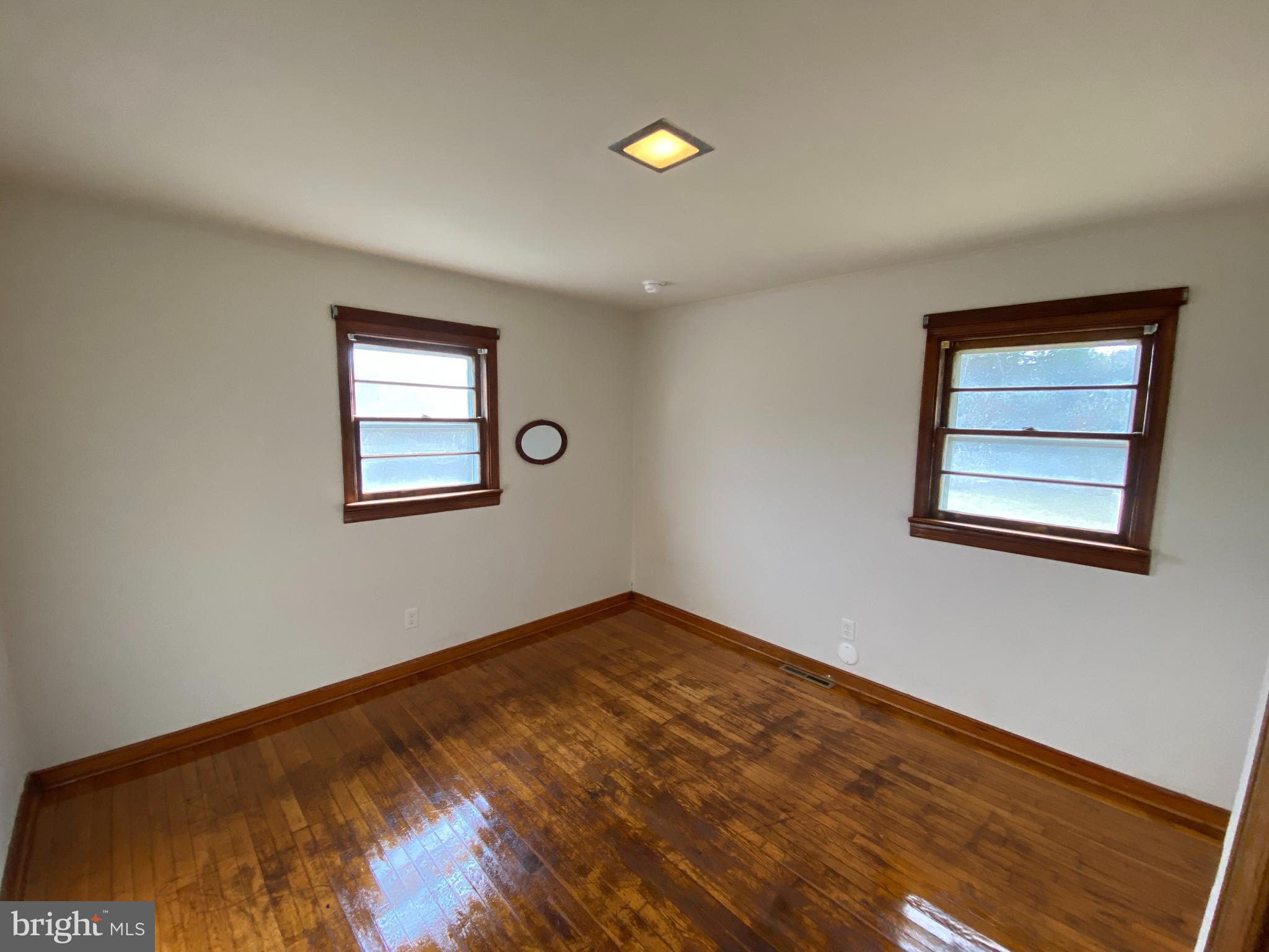 10514 Robert E Lee Drive Spotsylvania, VA 22551 - Photo 18 of 28 a view of empty room with wooden floor and fan