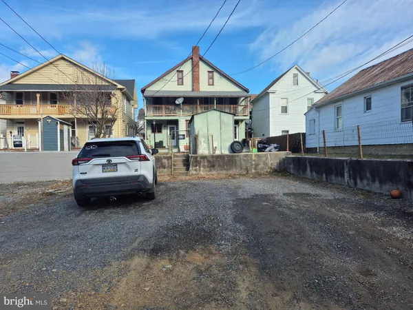 a car parked in front of a house