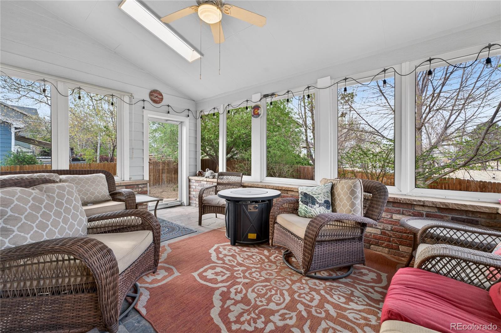 6289 Viewpoint Avenue Firestone, CO 80504 - Photo 16 of 45 a living room with furniture and a large window