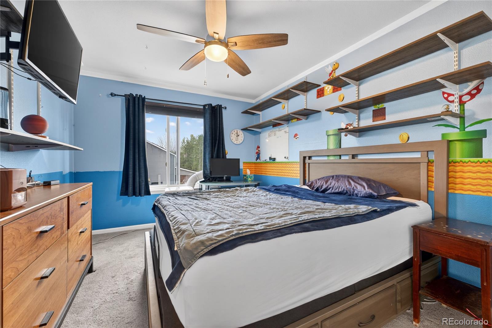 6289 Viewpoint Avenue Firestone, CO 80504 - Photo 27 of 45 a bed room with a bed and furniture