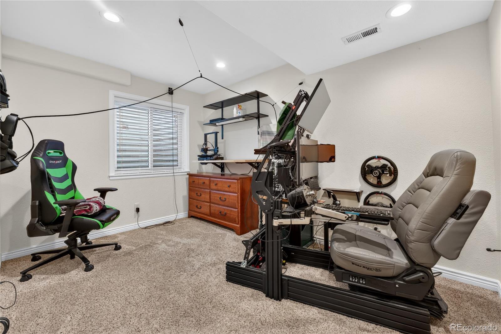 6289 Viewpoint Avenue Firestone, CO 80504 - Photo 31 of 45 a view of a room with gym equipment