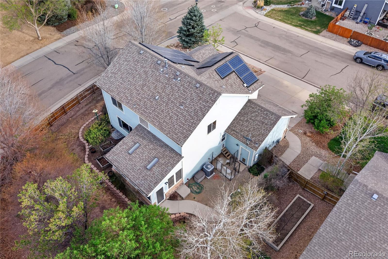 6289 Viewpoint Avenue Firestone, CO 80504 - Photo 37 of 45 an aerial view of a house with a yard