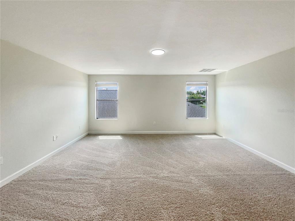 19491 Paddock View Drive Tampa, FL 33647 - Photo 19 of 28 a view of an empty room with a window