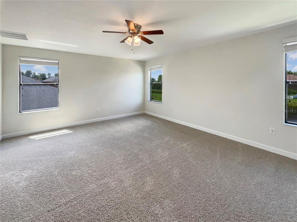19491 Paddock View Drive Tampa, FL 33647 - Photo 20 of 28 a view of an empty room with a window