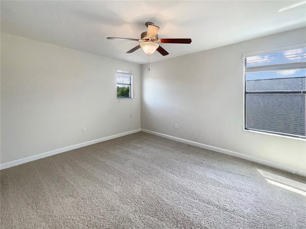 19491 Paddock View Drive Tampa, FL 33647 - Photo 24 of 28 a view of an empty room with a window