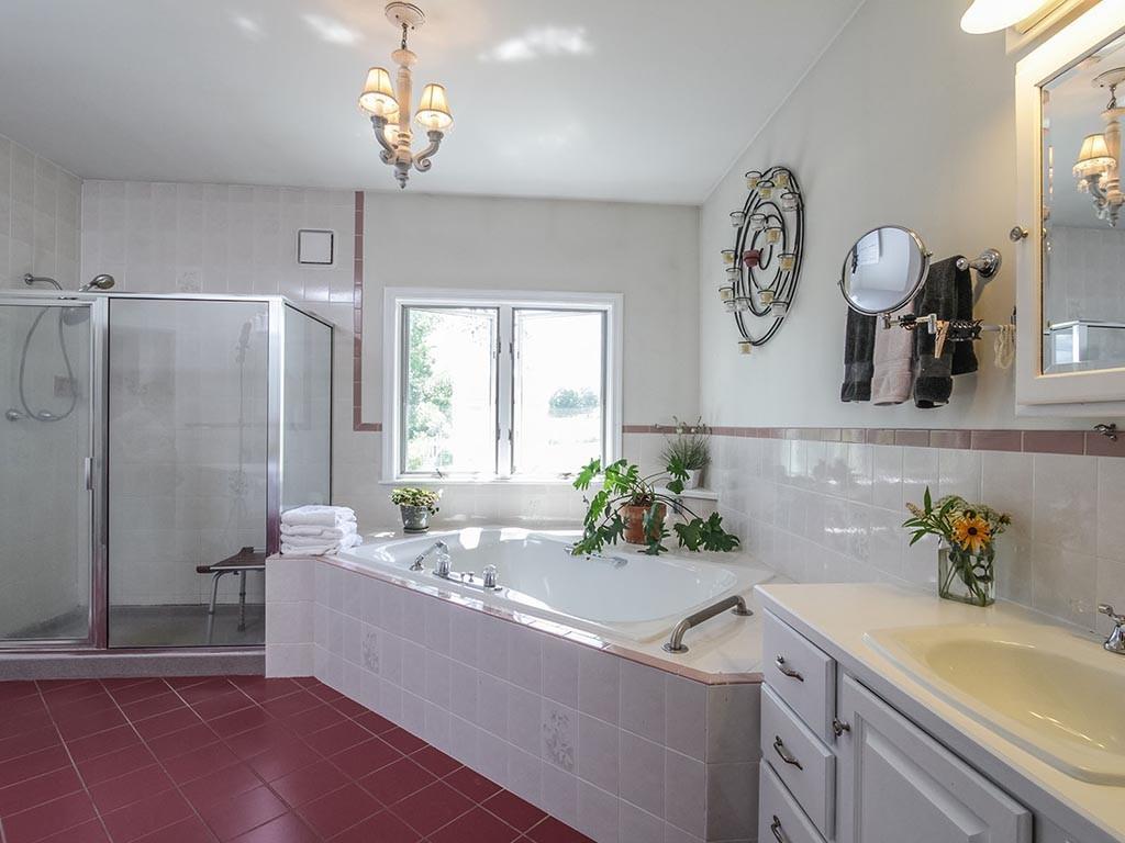 107 Wallentine Road Bowdoinham, ME 04008 - Photo 17 of 35 The generous master bathroom has...