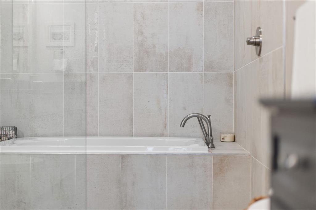 3725 Butler Street, Unit 304 Pittsburgh, PA 15201 - Photo 14 of 26 a bathroom with a shower