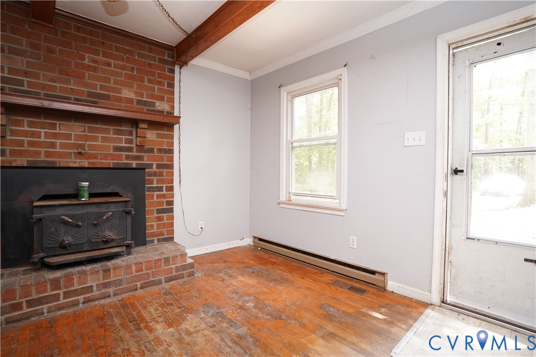 1439 Mahixon Road Manquin, VA 23106 - Photo 5 of 13 Unfurnished living room featuring a baseboard heat