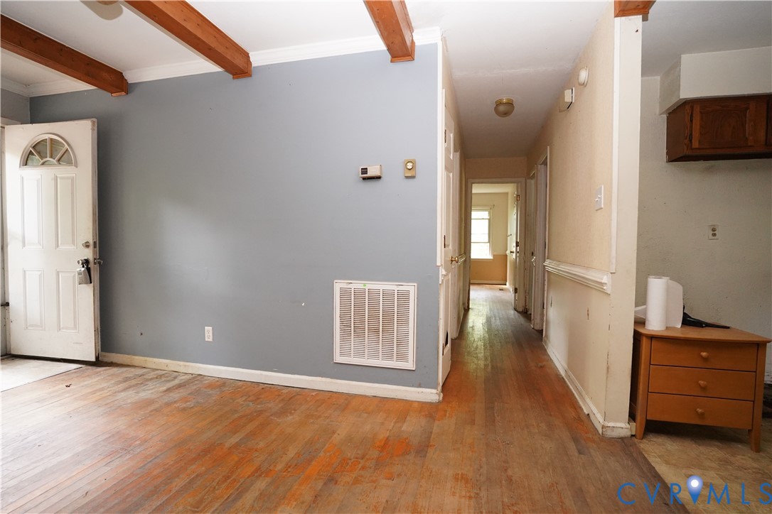 1439 Mahixon Road Manquin, VA 23106 - Photo 8 of 13 Foyer featuring light wood-style flooring and beam