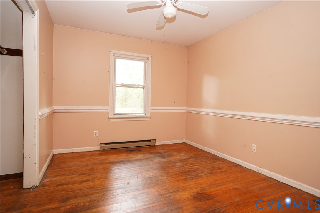 1439 Mahixon Road Manquin, VA 23106 - Photo 9 of 13 Spare room with hardwood / wood-style flooring, a