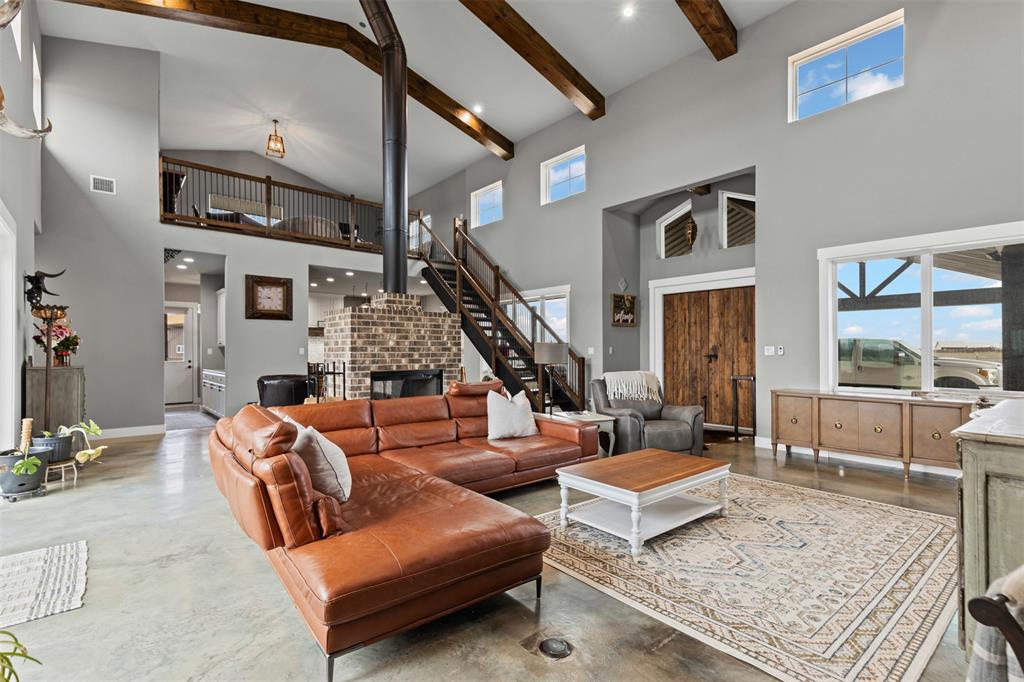 201 W Road Waxahachie, TX 75165 - Photo 13 of 40 a living room with furniture and a rug